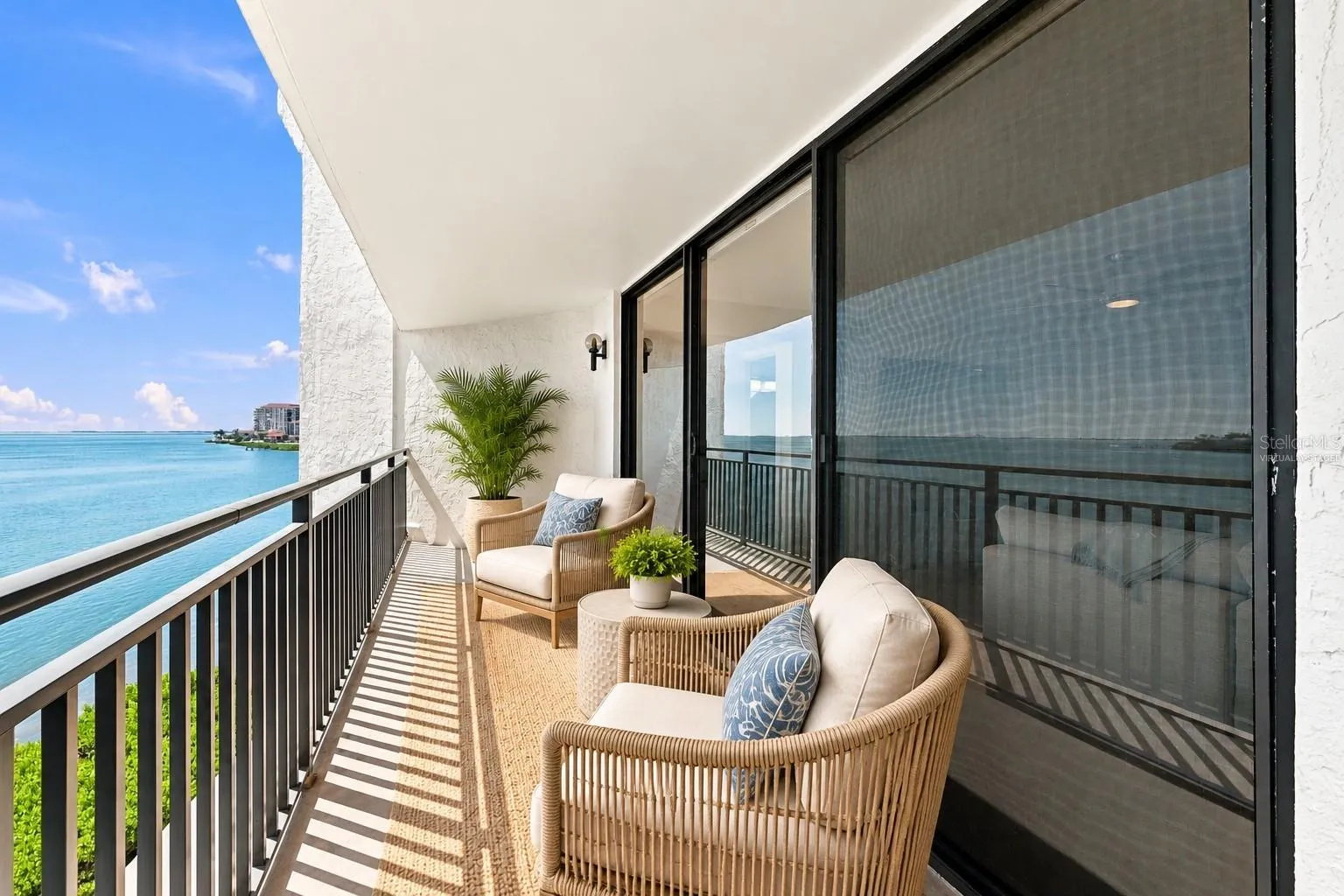 Virtually Staged -Imagine waking up and enjoying your morning coffee on the balcony overlooking the bay with the Skyway Bridge in the background.