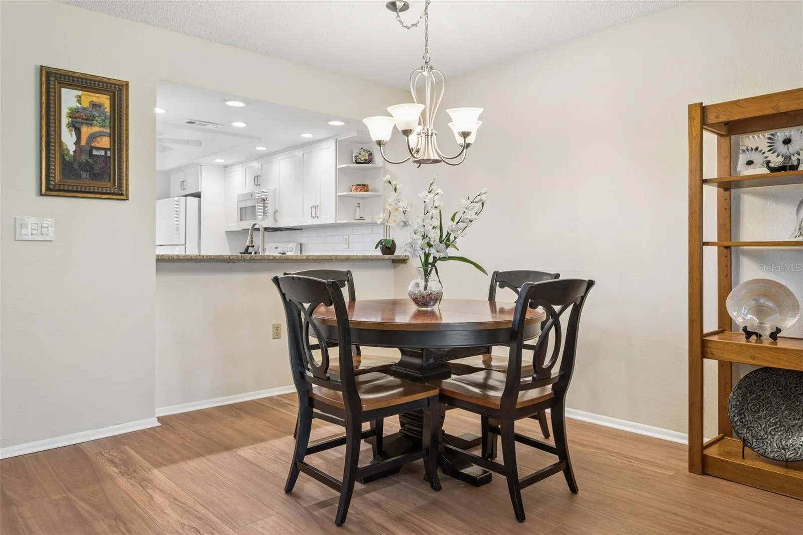 Dining area w/ bar counter.