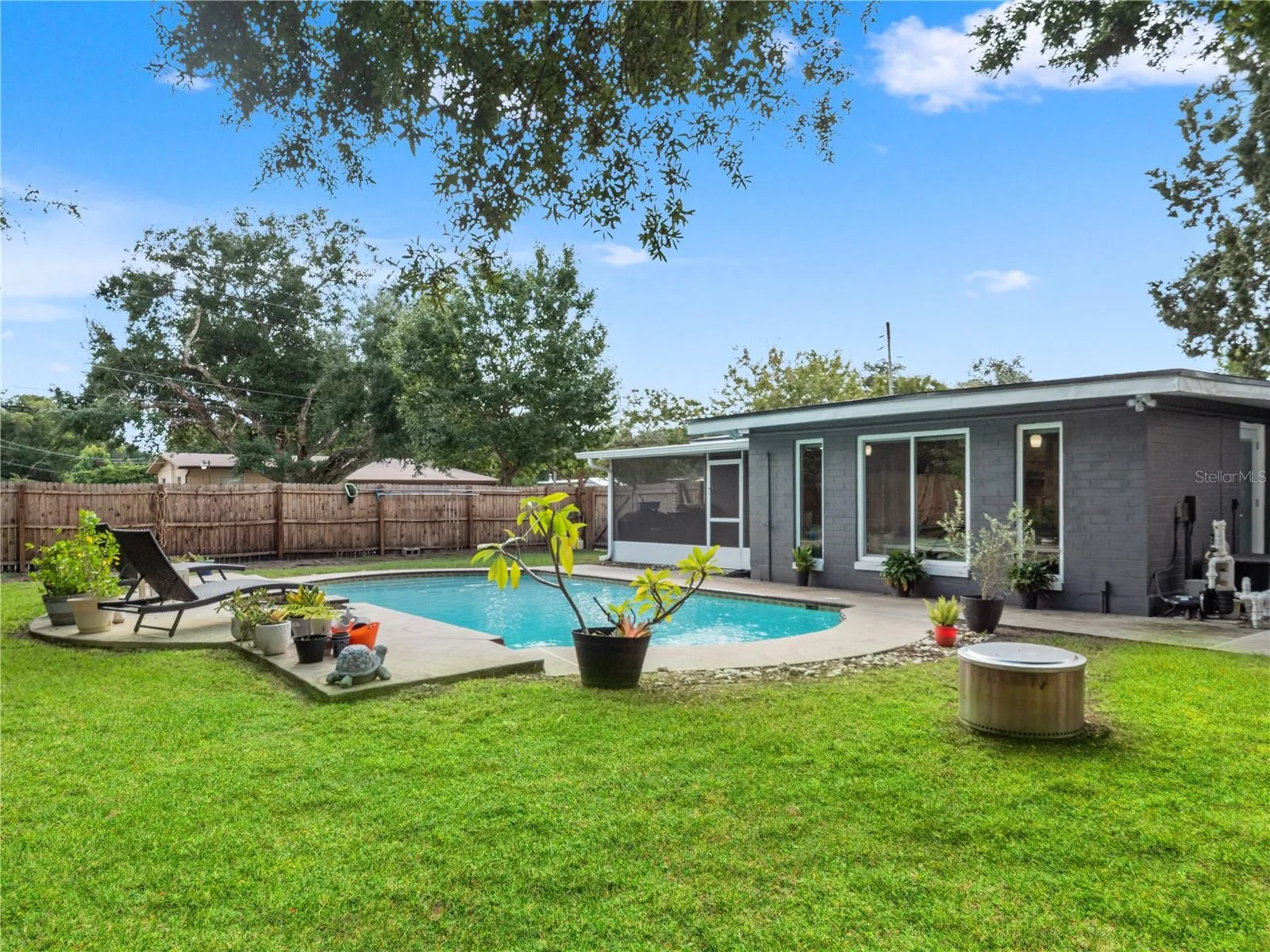 Massive pool and plenty of yard space left.