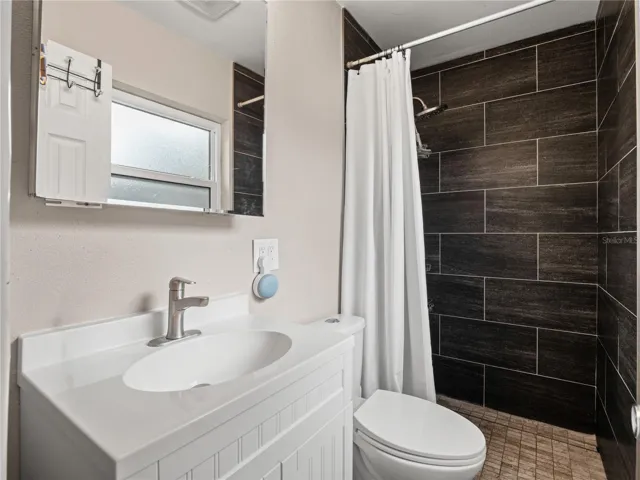 Primary en-suite with zero entry walk in shower.