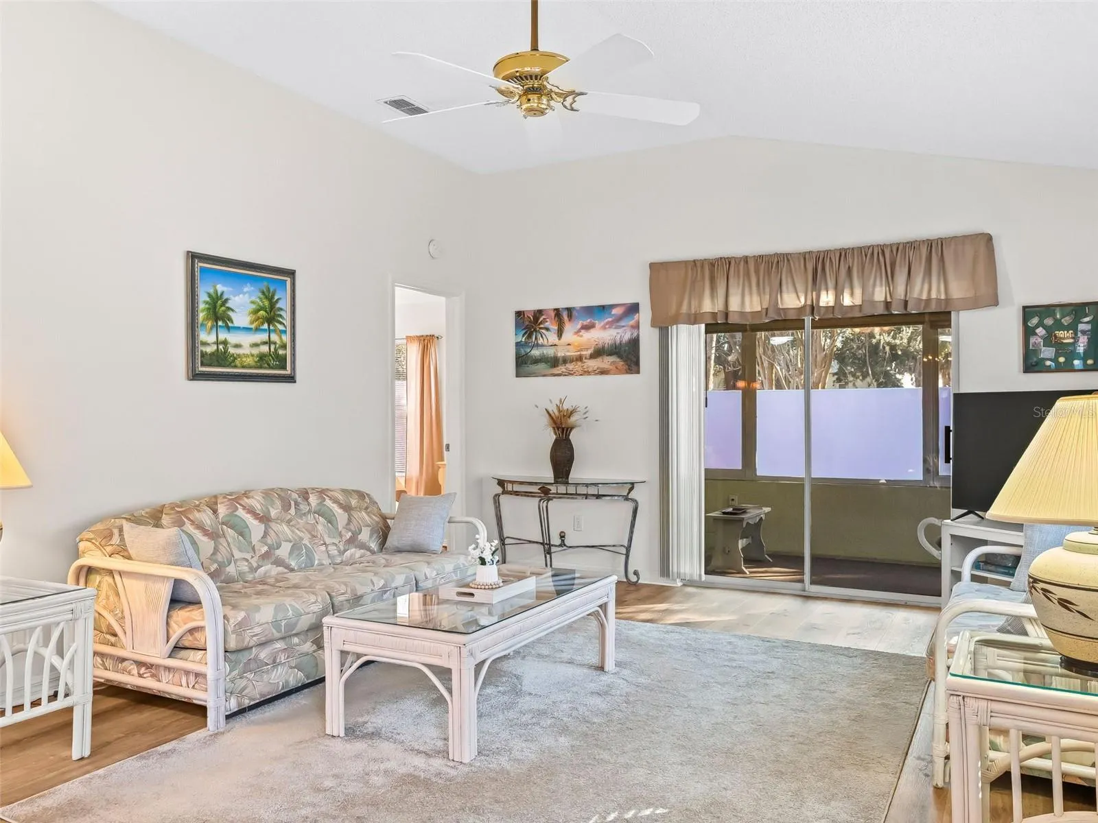 Great Room has sliding doors to the Florida Room