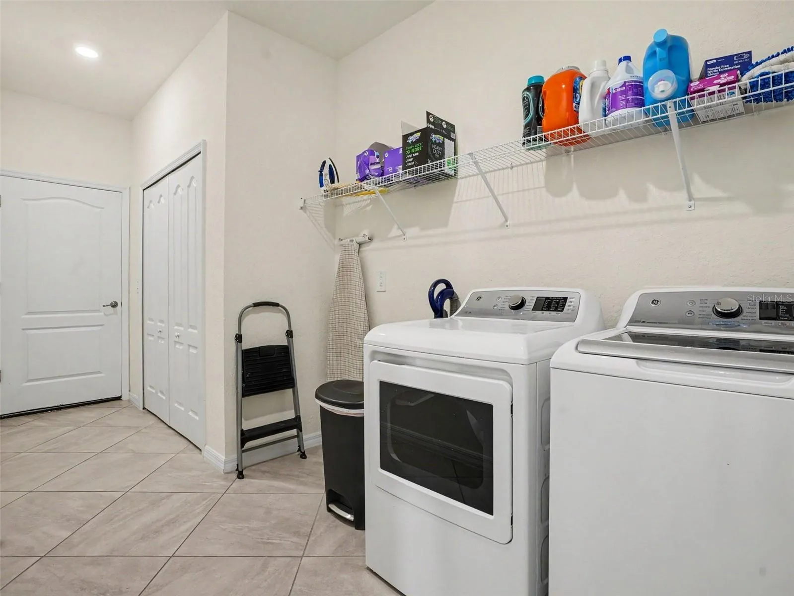 Laundry Room leading into the 2-car garage
