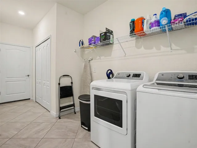 Laundry Room leading into the 2-car garage