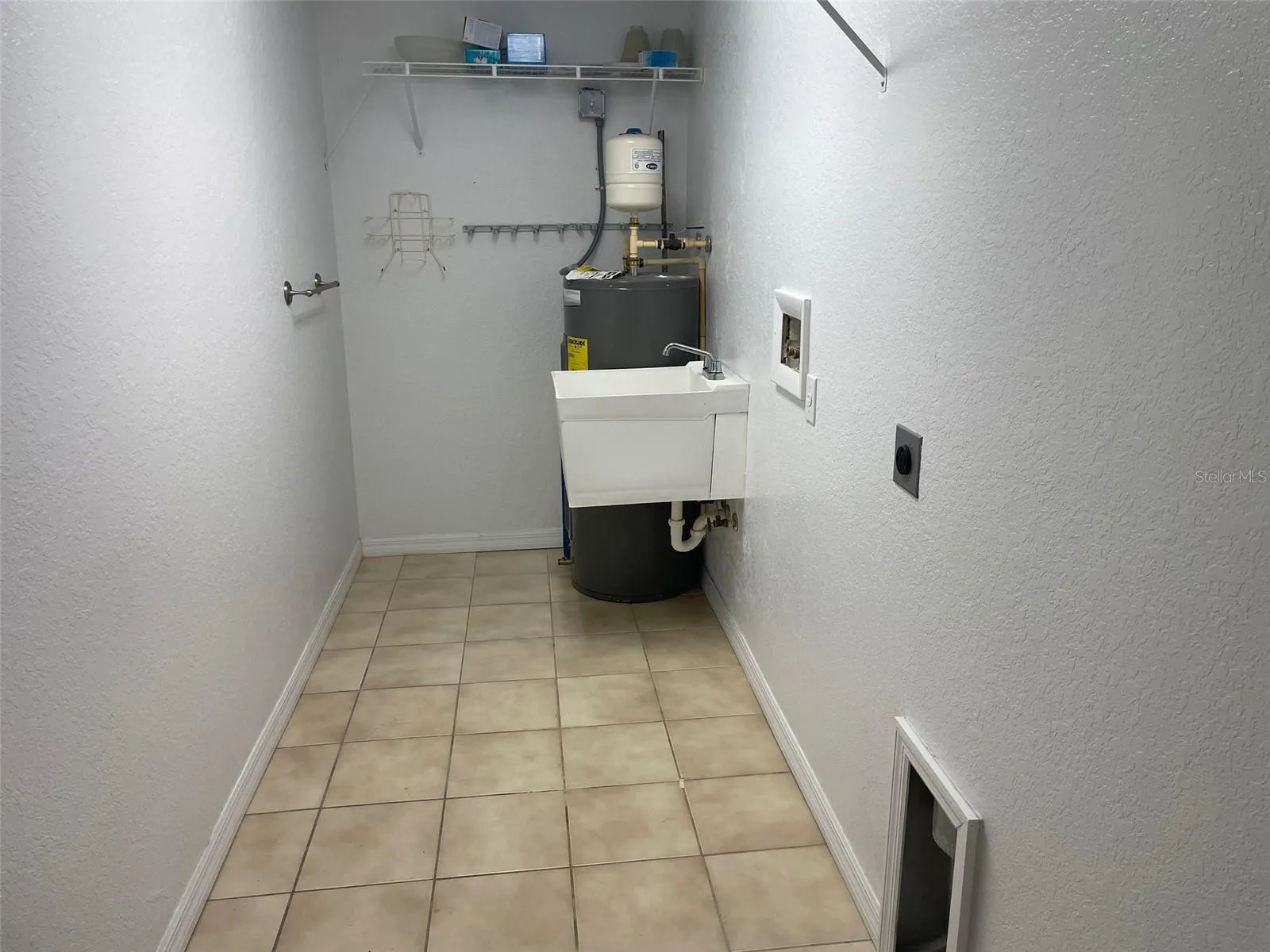 laundry room off garage in a airconditioned room