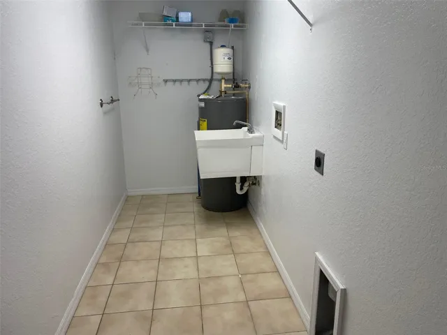 laundry room off garage in a airconditioned room