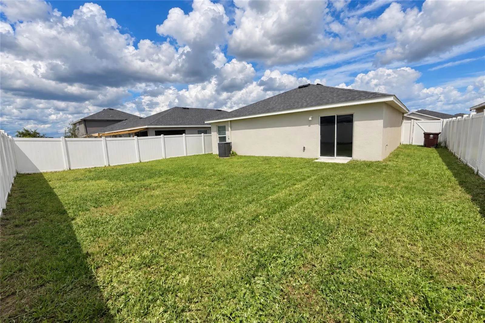 COMPLETELY FENCED BACKYARD