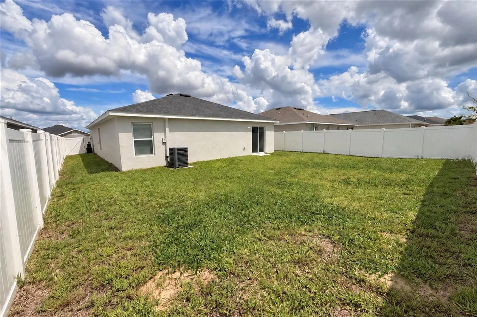 SPACIOUS BACKYARD WITH THE CONVENIENCE OF THE PRIVACY FENCE