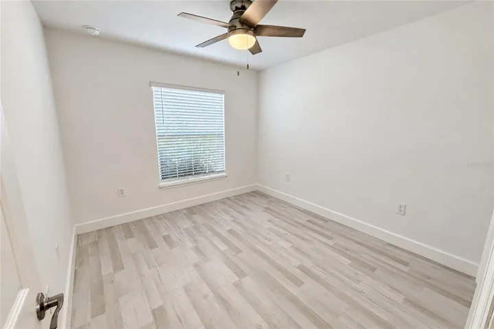 BEDROOM VIEW. CEILING FAN INCLUDED.