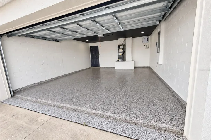 DOUBLE GARAGE WITH EPOXY FLOORING, AND TANKLESS WATER HEATER