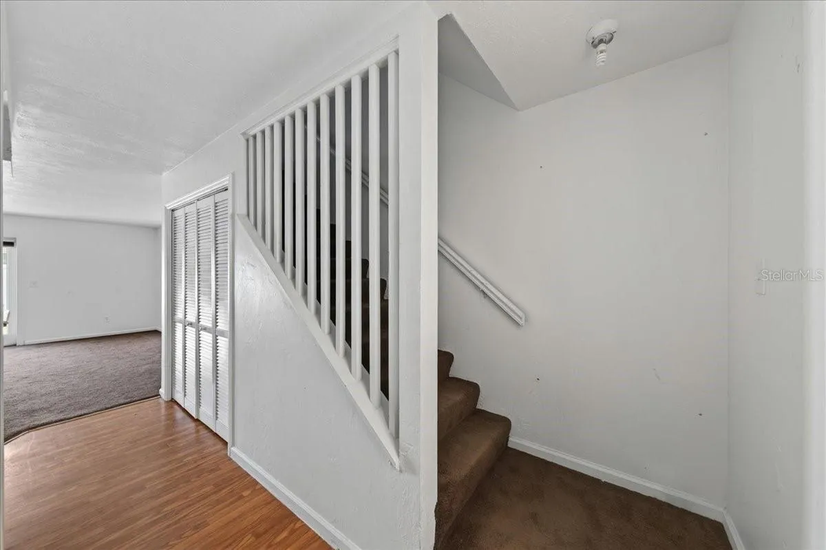 Unit 845 Foyer and view of stairs