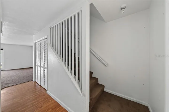 Unit 845 Foyer and view of stairs
