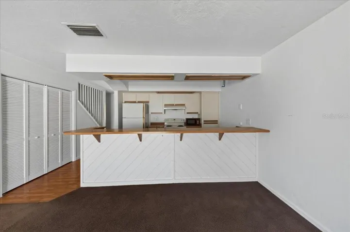 Unit 845 kitchen with view of breakfast bar