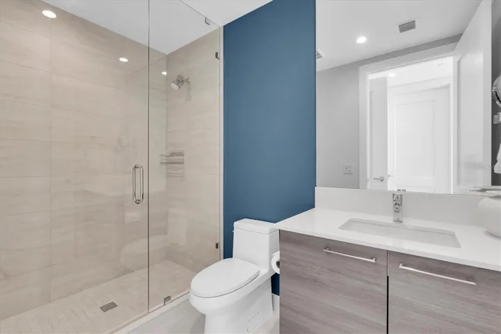 Modern full bathroom guest ensuite with premium fixtures.