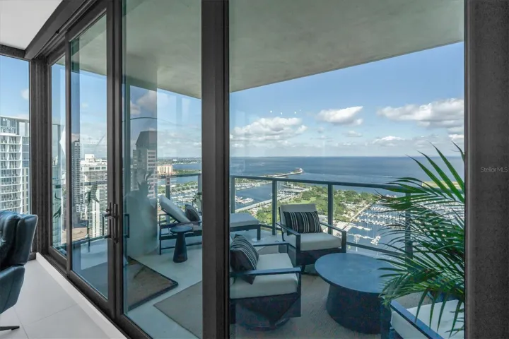 Water views through impact glass doors.