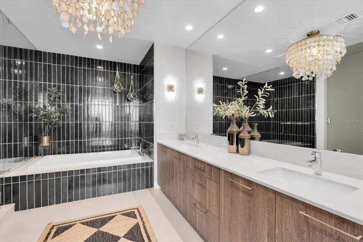 Double vanity with quartz counters.