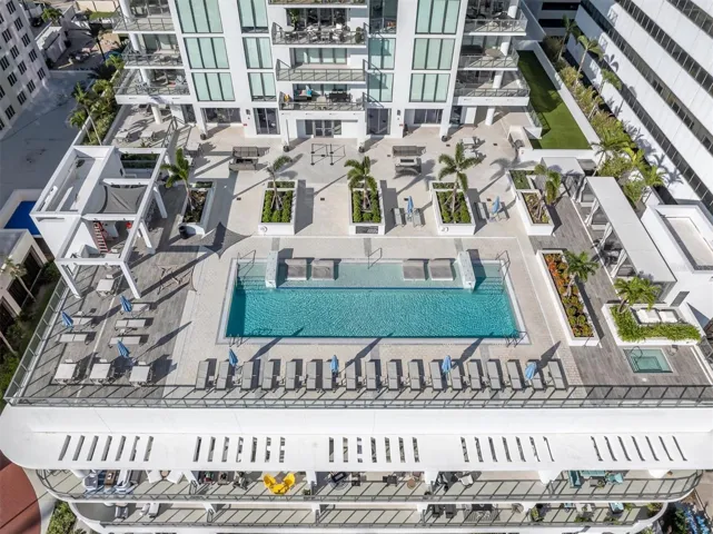 Serene pool deck water feature area overlooking Tampa Bay.