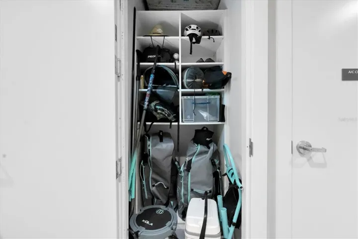 Spacious utility storage closet for organization.