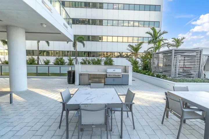 Relaxing poolside seating on private amenity deck.