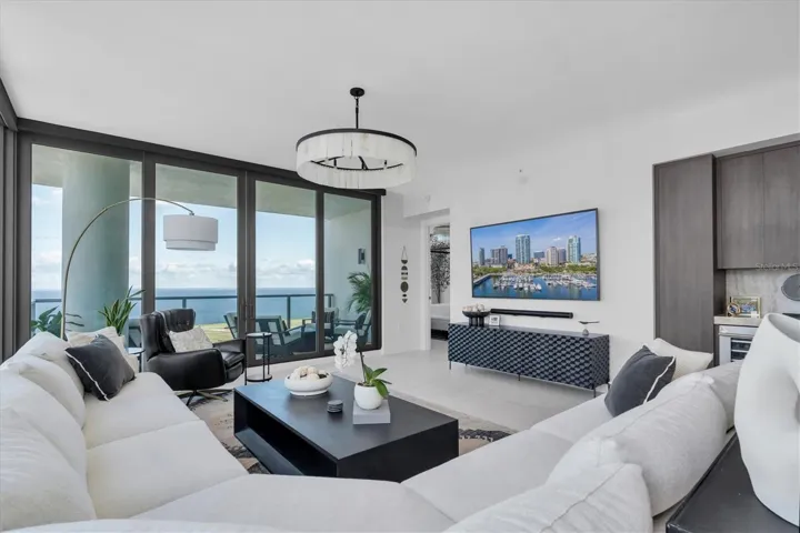 Formal dining space framed by city views.