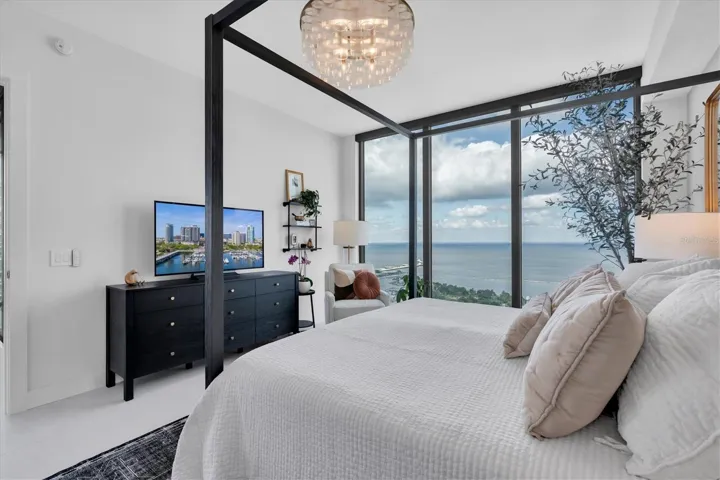 Spacious primary bedroom with modern finishes.