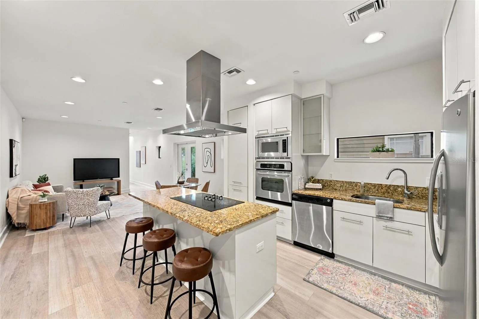 island and stainless steel appliances