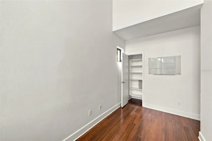 and a closet and door making it a possible 4th bedroom