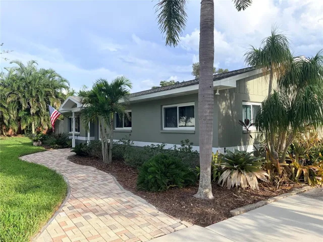 3 bedroom, 2 bathroom home with so much garage space and parking!! Oversized lot with 5 car garage, carport for 2+ vehicles, parking on the driveway for 6+ vehicles, + parking for a golf cart.