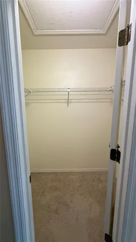 Primary has a Walk in closet  as well as a Wall Closet