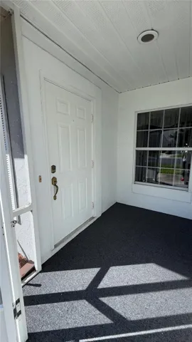 Front Covered / Screened Entry Porch with Brand New Indoor outdoor Carpet