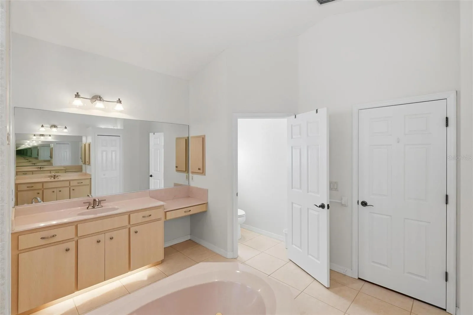 Primary Bathroom second vanity with built-in make-up area...