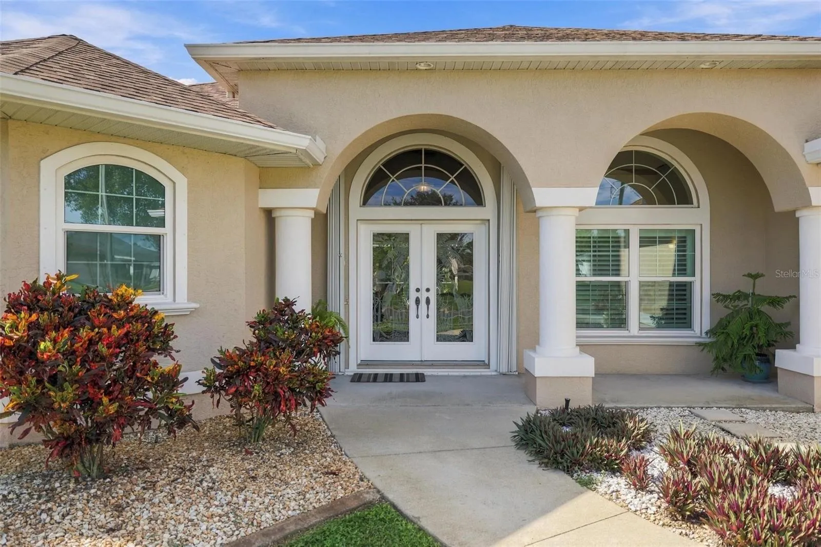 Enter through the decorative etched glass doors....