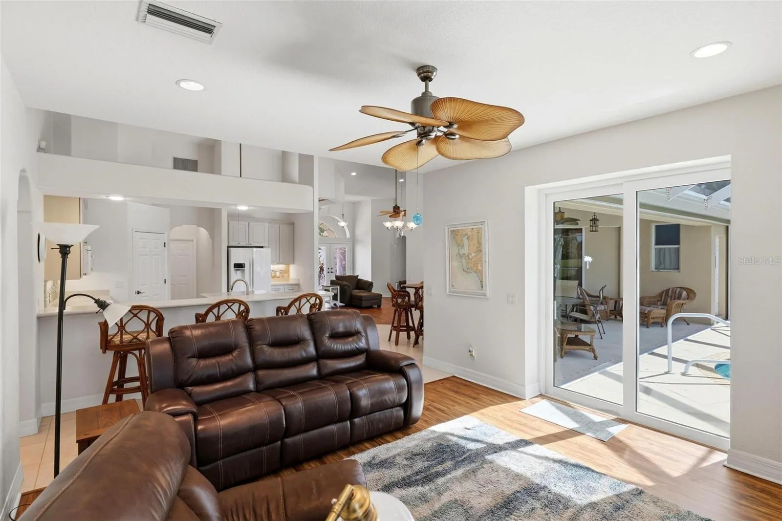 Great view of the Family room to out back to the lanai and the Kitchen...