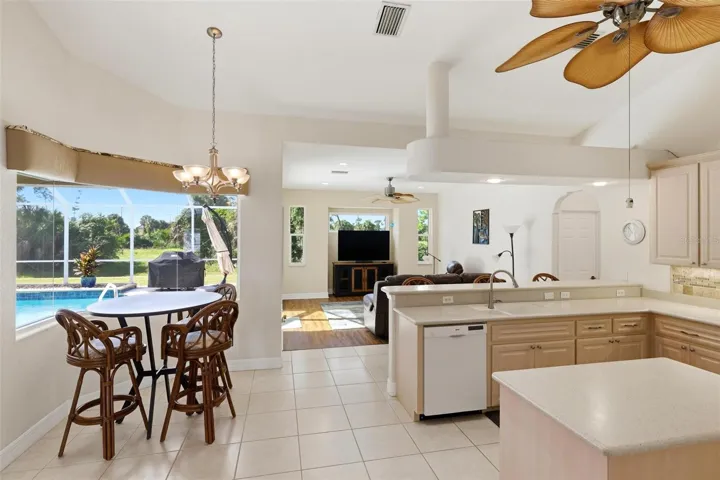 Kitchen Breakfast Nook.... Great views of the pool and the scenic views behind the home...