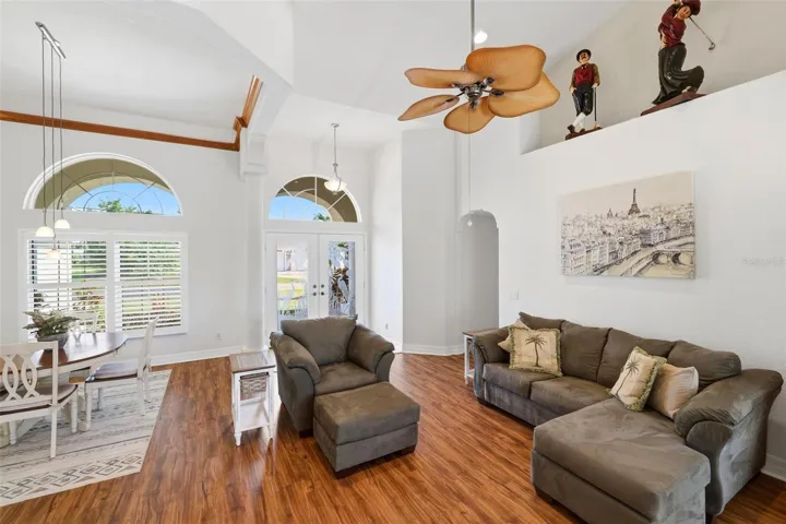 Living room has high vaulted ceilings...