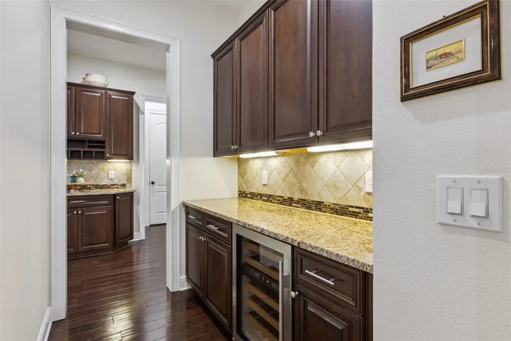Butler Pantry with additional storage and wine refrigerator