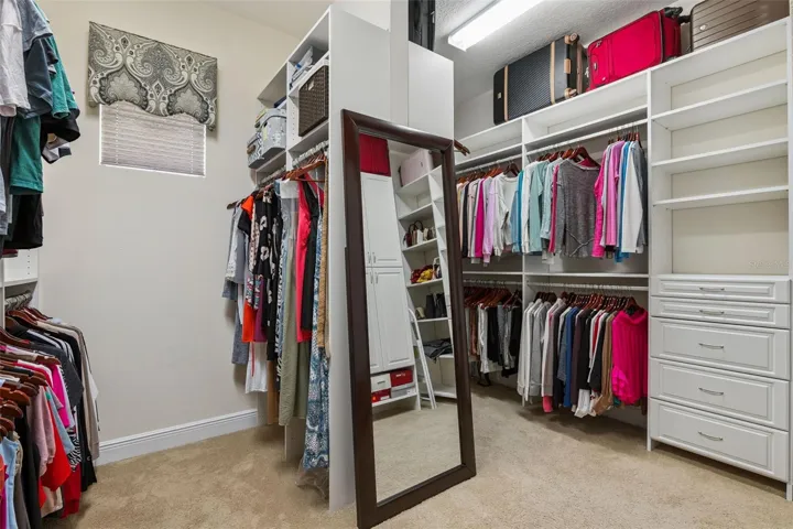 Oversized Primary closet with built ins