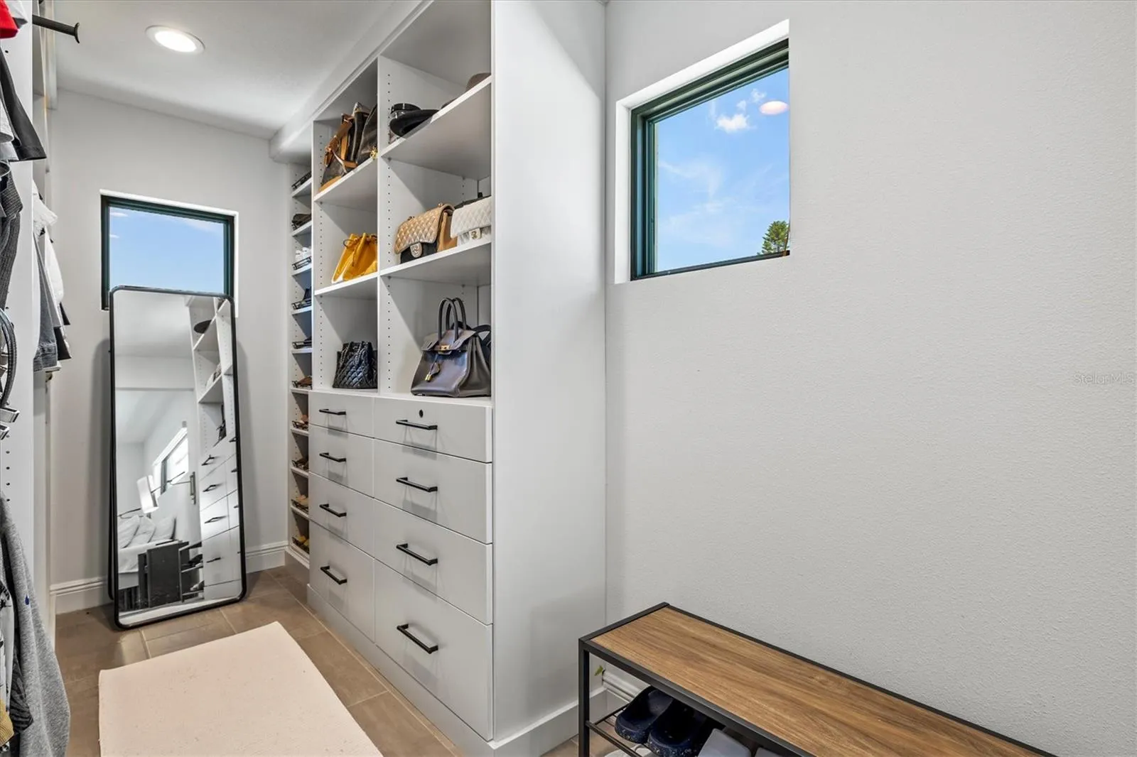 Primary walk-in closet.