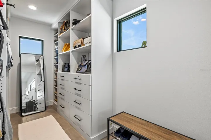 Primary walk-in closet.