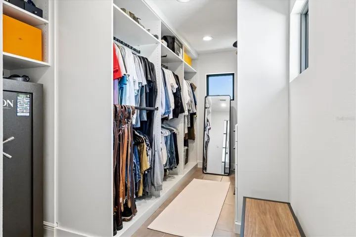 Primary walk-in closet.