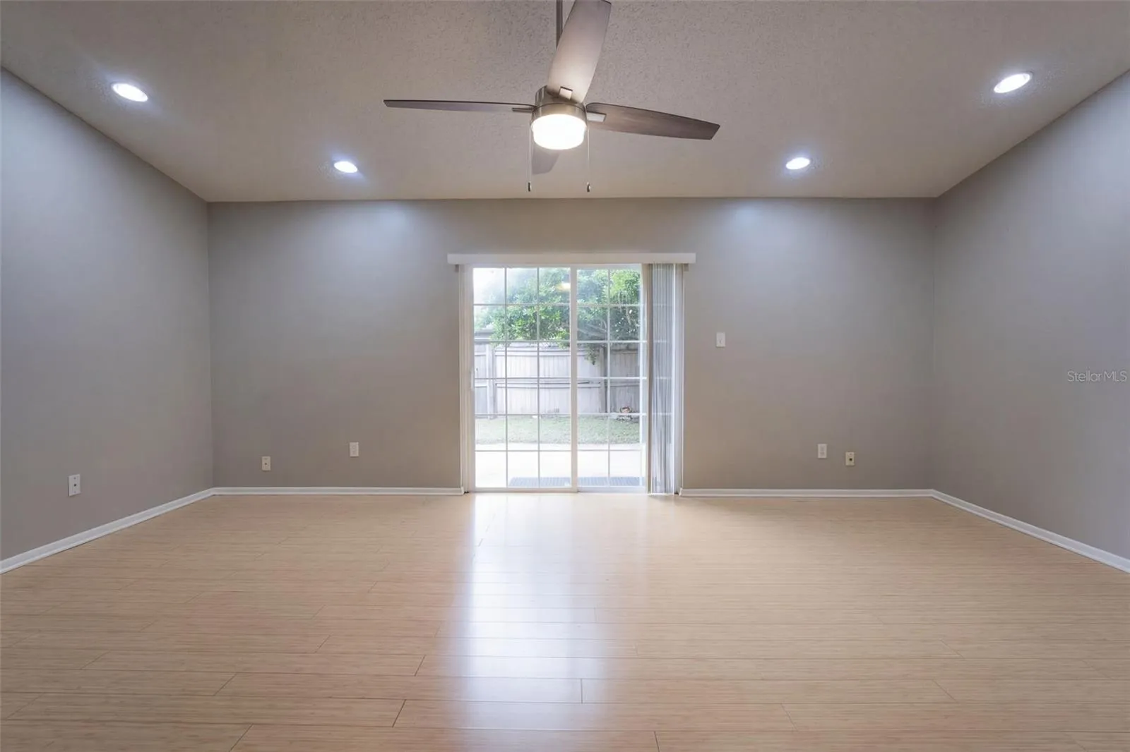 Great Room with recessed lights and vaulted ceilings