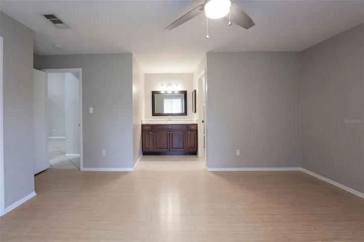 Primary Bedroom showing Vanity to Bath