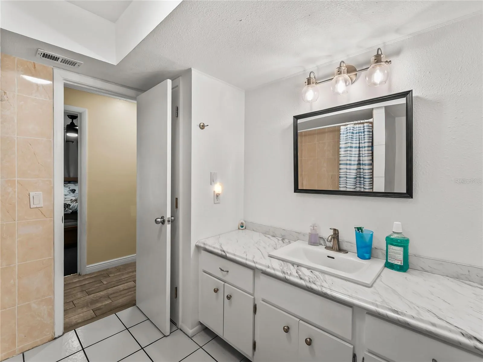 Guest bath - view 2.  This space easily accommodate a dual sink vanity.