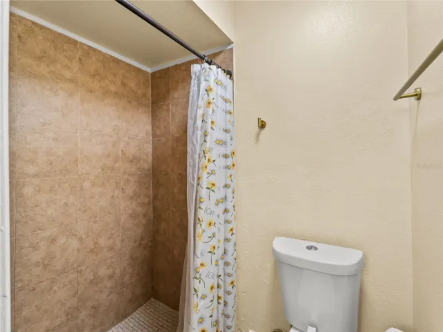 Primary shower/toilet room.
