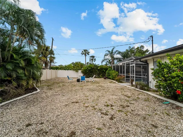 Right side yard.  Note the concrete landscape curbing all around.