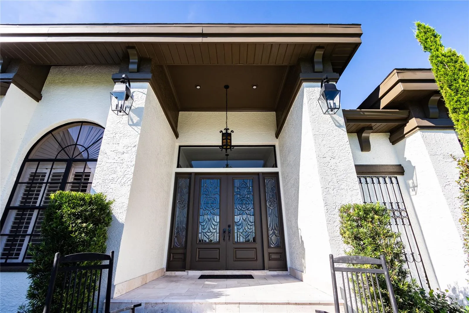 Tall lead beveled double glass doors!