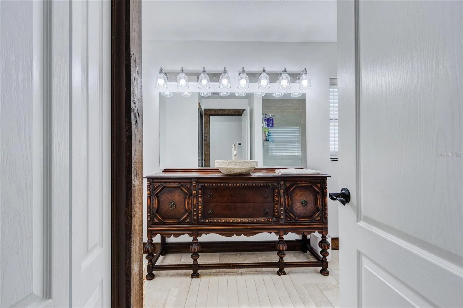 Bathroom with tub-shower combo and linen closet!
