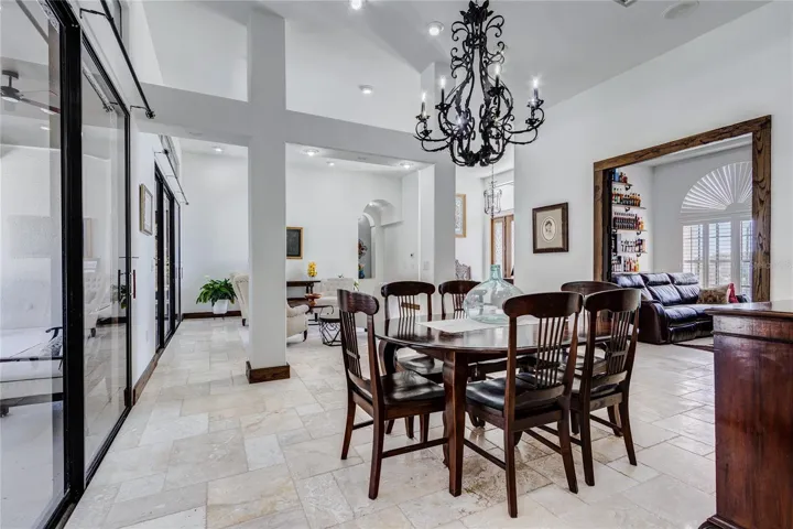 Dining area with sliders that lead to pool!