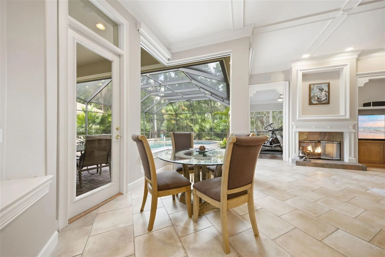 Breakfast nook overlooking pool and private yard
