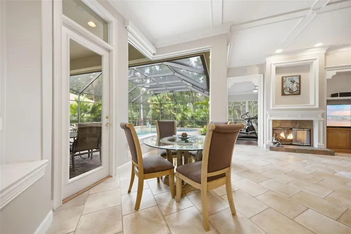 Breakfast nook overlooking pool and private yard