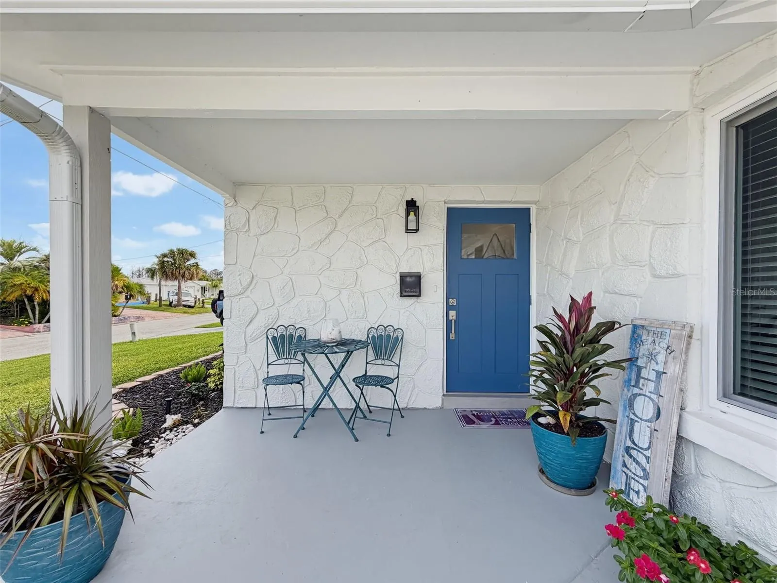 COVERED FRONT PORCH...